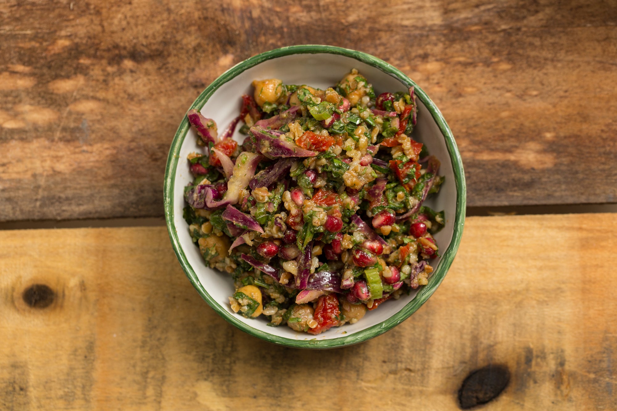 Farro and Chickpea Salad in a white and green bowl